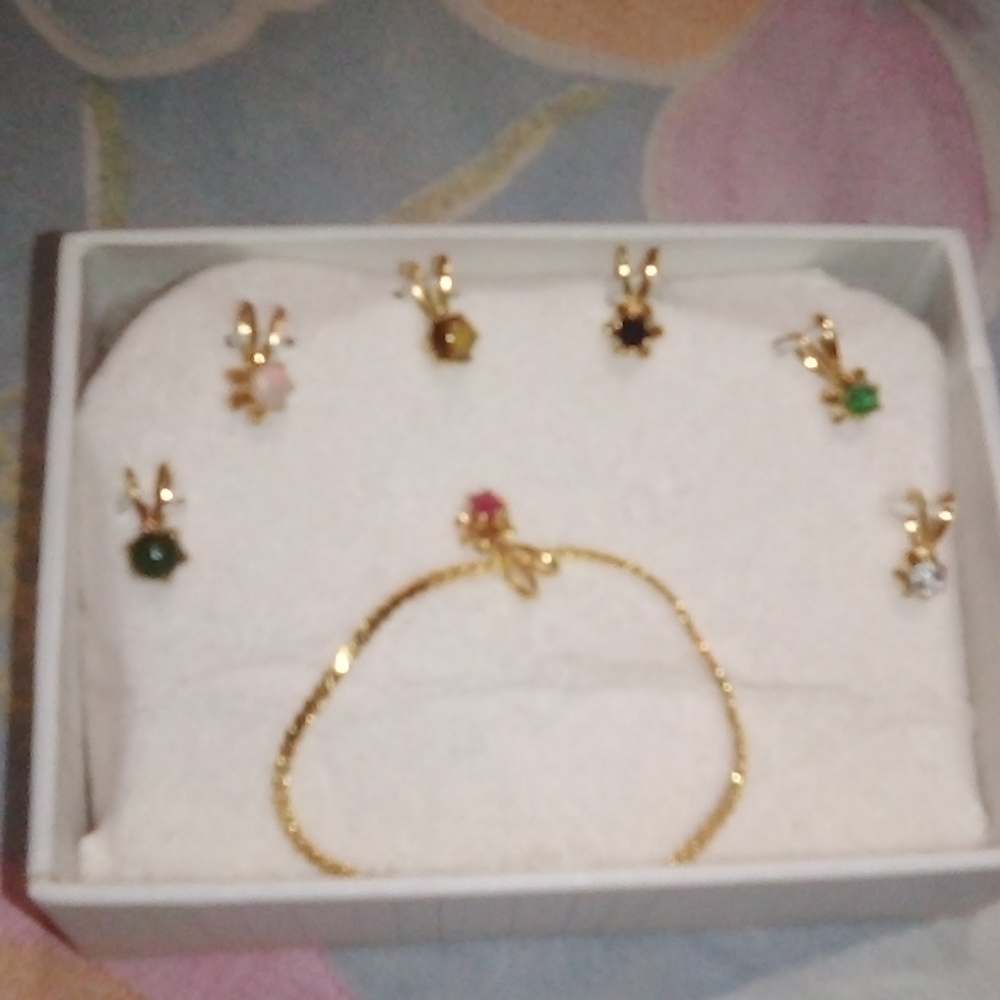 Gold plated necklace with interchangeable charms
